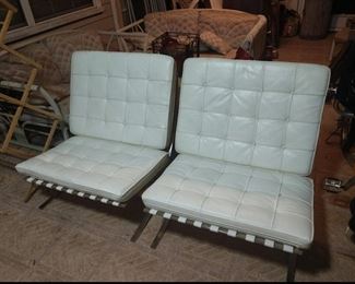 Circa 1970's or early 1980's Barcelona style chairs. Leather and legs in great condition