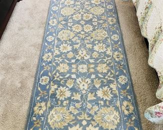there are two of these beautiful wool rug runners