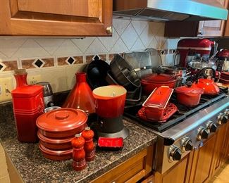 Collection of Le Creuset Pots and Accessories