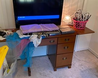 sewing machine,  flat screen TV,  material/ tooling