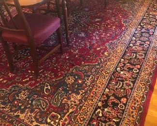 This beautiful hand knotted Persian rug is a 9’11” x 13’ size.  All wool and full of vibrant colors, this rug is the perfect dining room size.
