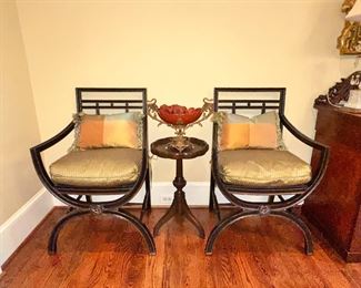 Pair Black w Gold accent arm chairs w silk cushions. Cane seating under cushion. 
Sale $750