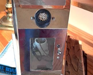 Written on the back - "Property of Indoor ADV. Co.  Cigarette/cigar lighter??