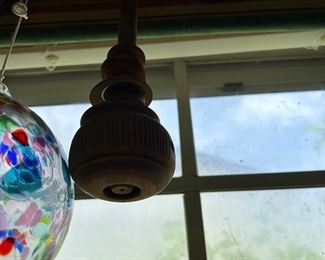 Friendship ball and an old wooden whisk also used as a hot chocolate stirrer
