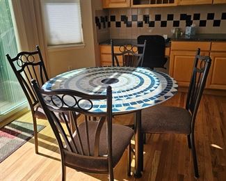 45" Round Glass top Kitchen Table w/4 Chairs- FYI it has a stretch tablecloth on it. 