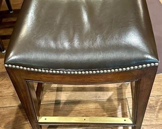 3 very nice Leather Bar Stools from Woodbridge Furniture with Nailhead Detail around the Seat. 24" H for a Counter. Very nicely made.