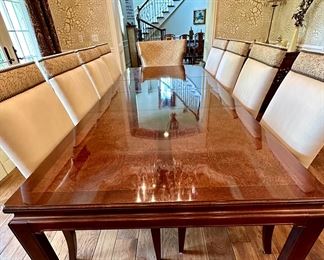 Absolutely Stunning Dining Room Table and Chairs. The Table is Henredon from their Campaign Chinoiserie Collection with 2 leaves made of Mahogany and Burl Wood. The Chairs are Hickory White. More into to come.