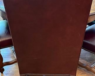 Custom Table made by Design Master. Table expands fro 54" Round to 70" Round plus total of 6 Custom Made Leather Chairs with Nail Head Trim. Looks like Brand New.