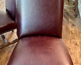 Custom Table made by Design Master. Table expands fro 54" Round to 70" Round plus total of 6 Custom Made Leather Chairs with Nail Head Trim. Looks like Brand New.