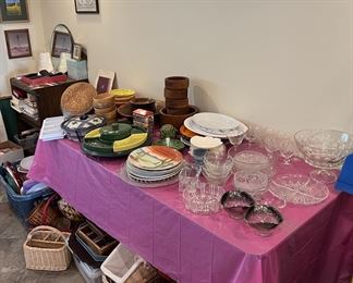 More serving pieces and dishwares. Several baskets are hiding out below.