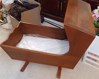 Handmade cradle made with wooden antique ironing boards