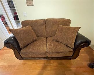 $175 - Love seat (some damage on arms) (measurements: 66" x 40" x 38")