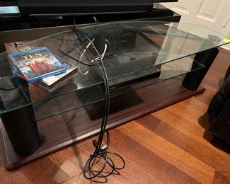 143. Glass Top Entertainment Table (58" x 19" x 18") 144. Sony DVD