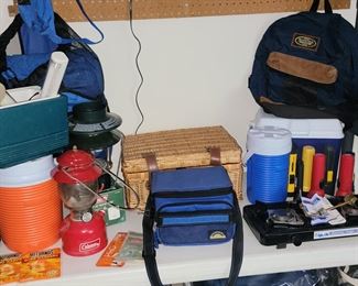 Camping gear (coolers, lanterns, tent, sleeping bags, picnic basket)