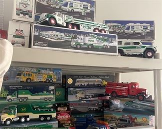 Hess mobile , large small and loads of in between Hess toy trucks most are mint in the box!!!