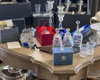 Waterford Crystal Millenium flutes, bells, lighters, clocks , candlesticks, dishes Plus a large coffee table 