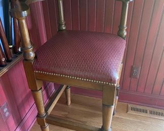 Set of three corner pub chairs with woven red leather seats.  $1,200/set.