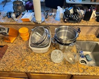 knives, pot and pans, pens, cookware