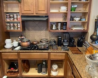 juicer, lamp, blender, collector mugs, cutting boards, coffee maker