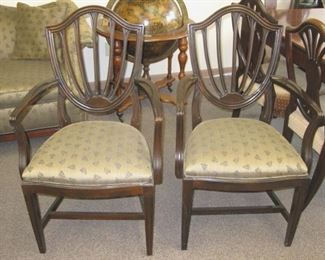Two shield back arm chairs with upholstered seats