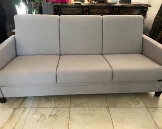 Grey futon/never used! 