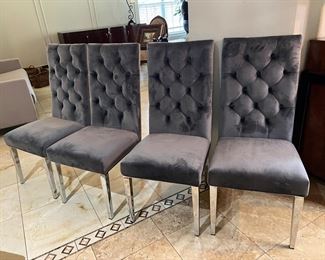 Contemporary, gray velvet chairs with chrome legs! New! Not used!