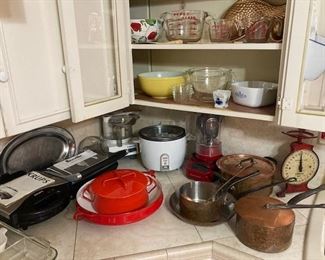 kitchen items including Pyrex, Dansk and Villedieu copper cookware