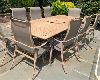 Cast Aluminum Rectangular Outdoor Table With 9 Arm Chairs In Cinnamon Finish By Beka