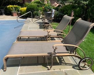 Pair Of Sling Chaise Lounges