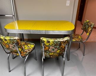 We have 3 chairs for this mid century table.