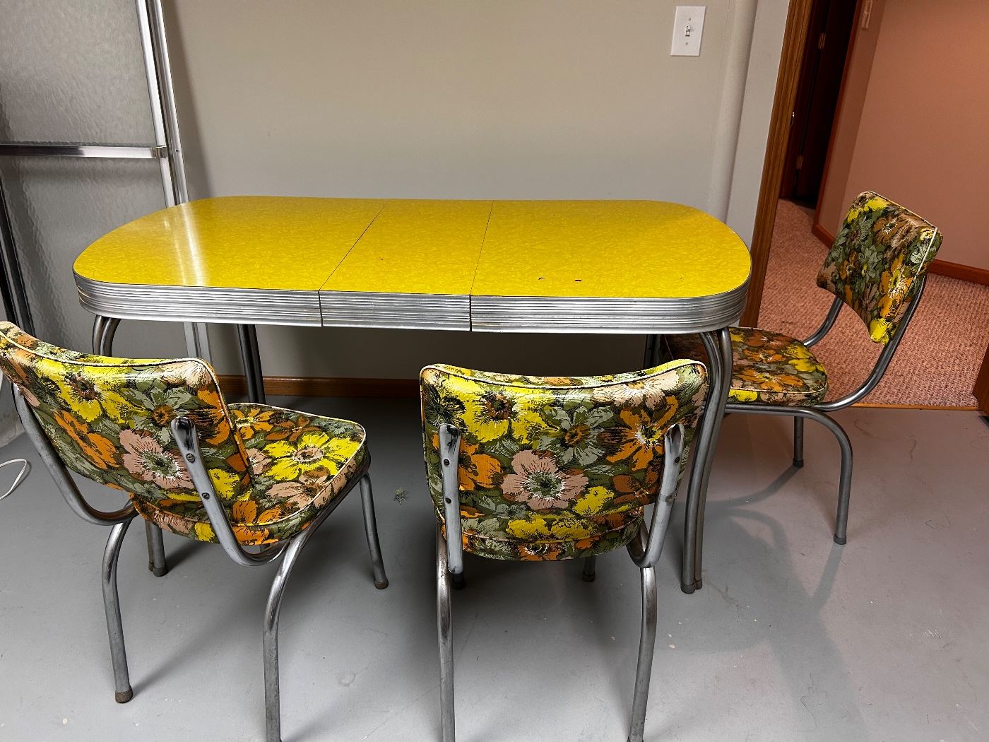 We have 3 chairs for this mid century table.