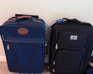 Wheeled carry-on luggage bags