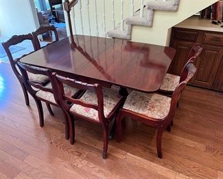 Cherry wood drop-leaf dining table and chairs