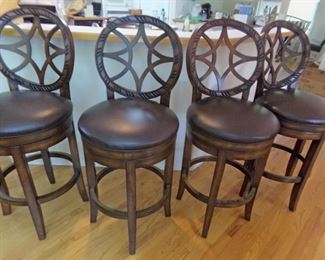 FOUR SWIVEL BAR STOOLS
