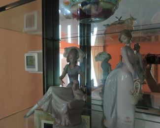 Lladro figurines shown in several pictures with titles following: