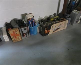 Garage:  finishing sander; miter saw;  6 hp. 2 gpm pressure washer, shop vac, leaf vacuum with small chipper