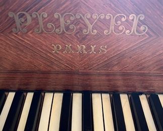 Antique Pleyel grand piano, brought over from France.