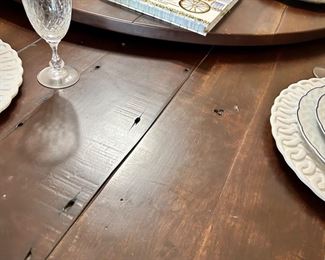 Round wood dining table with lazy Susan, seats 10 chairs. Custom-made for client in NC. Table is 84” diameter (note that sides do not fold down).
