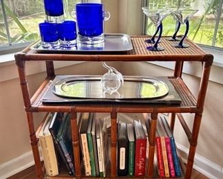 Vintage rattan bookcase with caned top and shelf