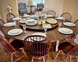 Round wood dining table with lazy Susan, seats 10 chairs. Custom-made for client in NC. Table is 84” diameter (note that sides do not fold down).