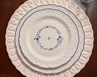 Set of 12 Limoges “Hortense” blue and white dinner plates and 12 luncheon plates. Also shown with set of white chargers.