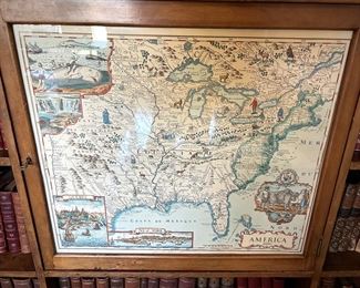 Antique bookcase with cupboard - cupboard door has inlaid map of 1600s USA