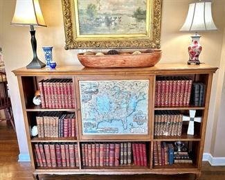 Antique bookcase with cupboard - cupboard door has inlaid map of 1600s USA