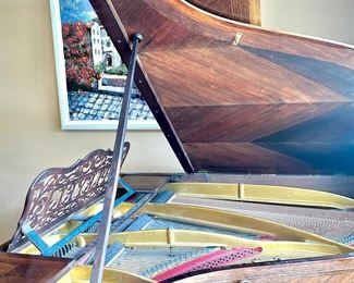 Antique c. 1900 Pleyel grand piano, brought over from France. (Pleyel was Chopin’s preferred piano brand.)