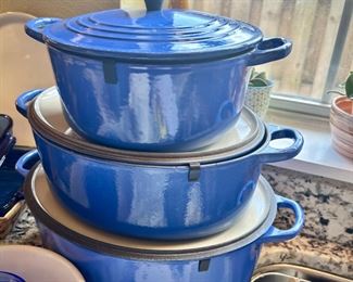 Three Le Creuset Blue Dutch ovens #22, #29, #33