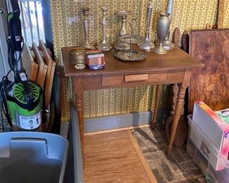Pretty small desk table with lamps and pewter items