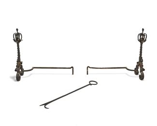 1045
Late 19th/early 20th century
A Spanish-Style Wrought Iron Andiron Set
Each large andiron with scrollwork, foliate motifs, and floral finial along with a matching handled fire poker, 3 pieces
Each andiron: 31" H x 36" W x 13" D; poker: 41" L x 5.25" W
Estimate: $800 - $1,200