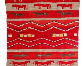 1046
Late 19th century; Diné
A Navajo Pictorial Blanket
Woven in red, cream, grey, black, and yellow wool with alternating bands of horse and train motifs, and serrated zigzags
84" H x 53.5" W
Estimate: $6,000 - $8,000