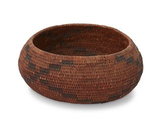 1049
Early/mid-20th century
A Small Pomo Basket
A small coiled basketry bowl with three stepped X-motifs to sides continuing to base
2" H x 4.75" Dia.
Estimate: $200 - $300