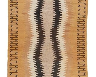 1058
Mid-20th century; Diné
A Navajo Regional Rug
Woven in ochre, black, cream, and grey wool with a central serrated zigzag column and complex serrated border
60" H x 33" W
Estimate: $300 - $500